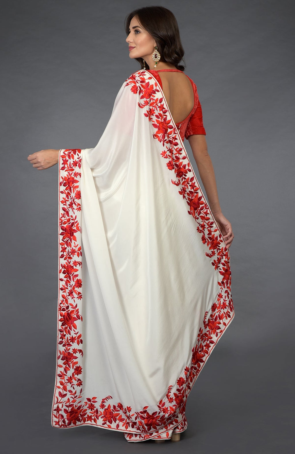 Ivory-red Parsi Gara hand-embroidered saree with floral borders.