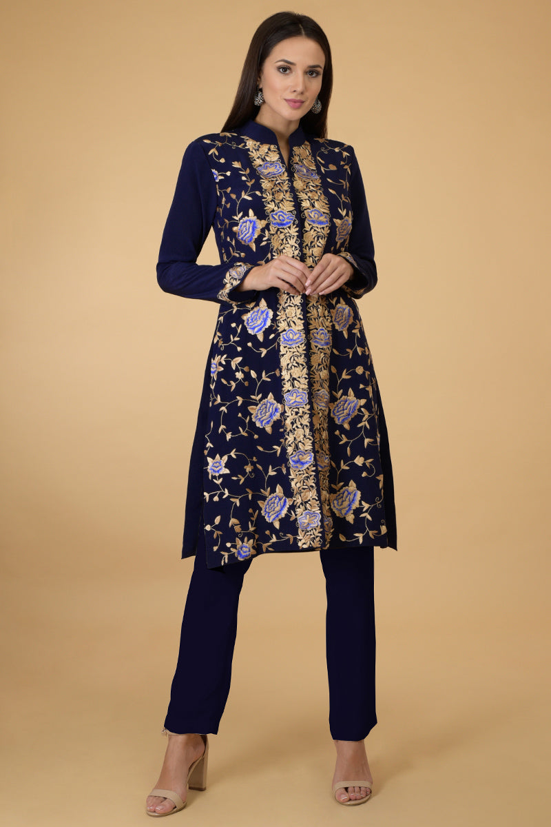 Midnight blue Parsi Gara jacket with floral embroidery, band collar, and matching pants.