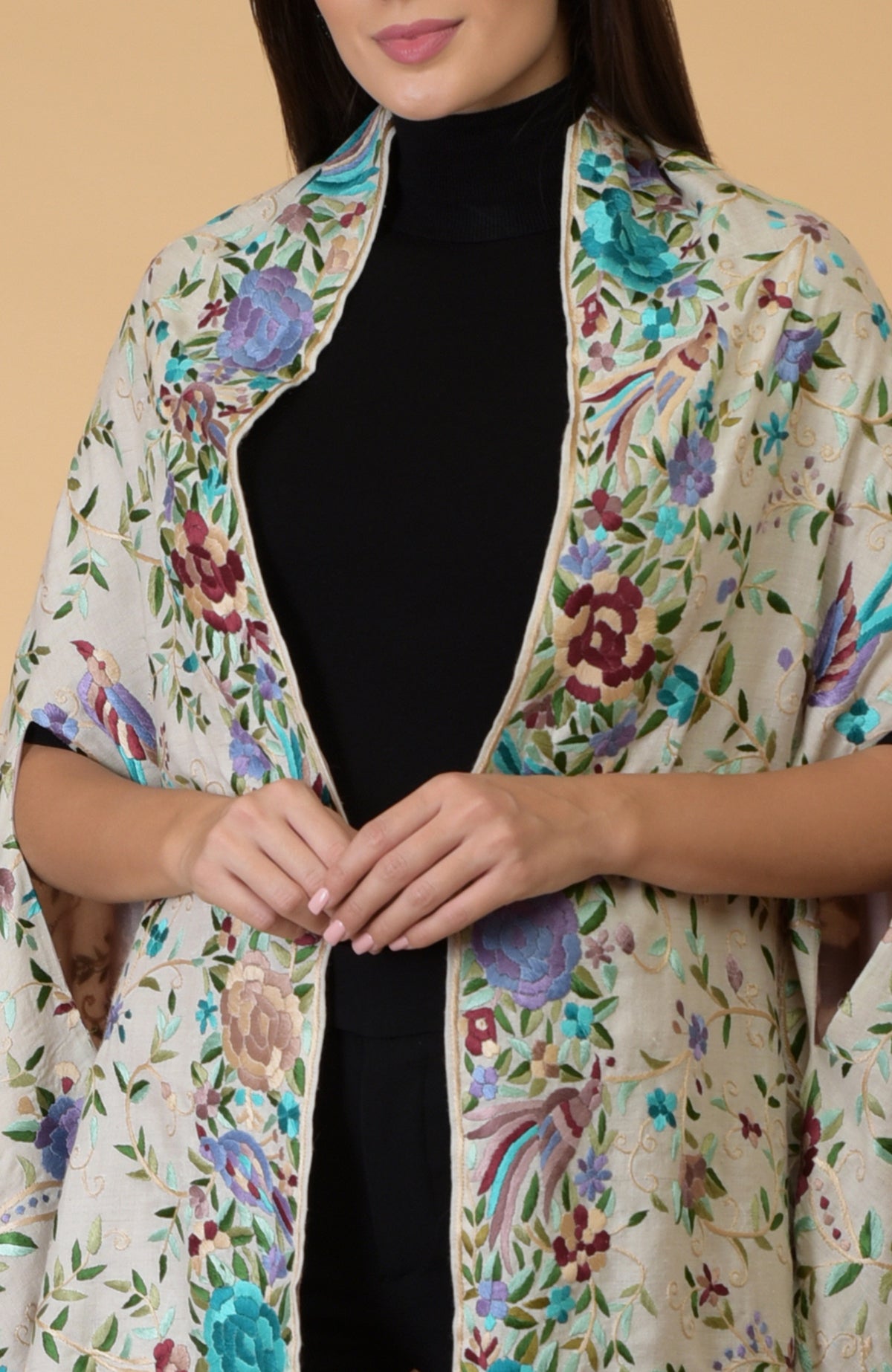 Ivory Parsi Gara pure pashmina shawl cape with intricate bird and floral embroidery.
