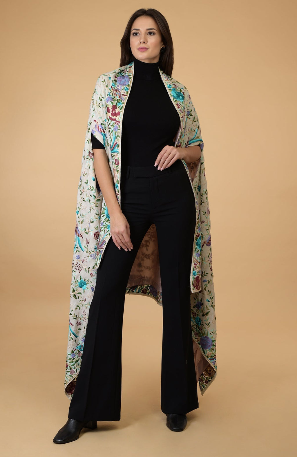 Ivory Parsi Gara pure pashmina shawl cape with intricate bird and floral embroidery.