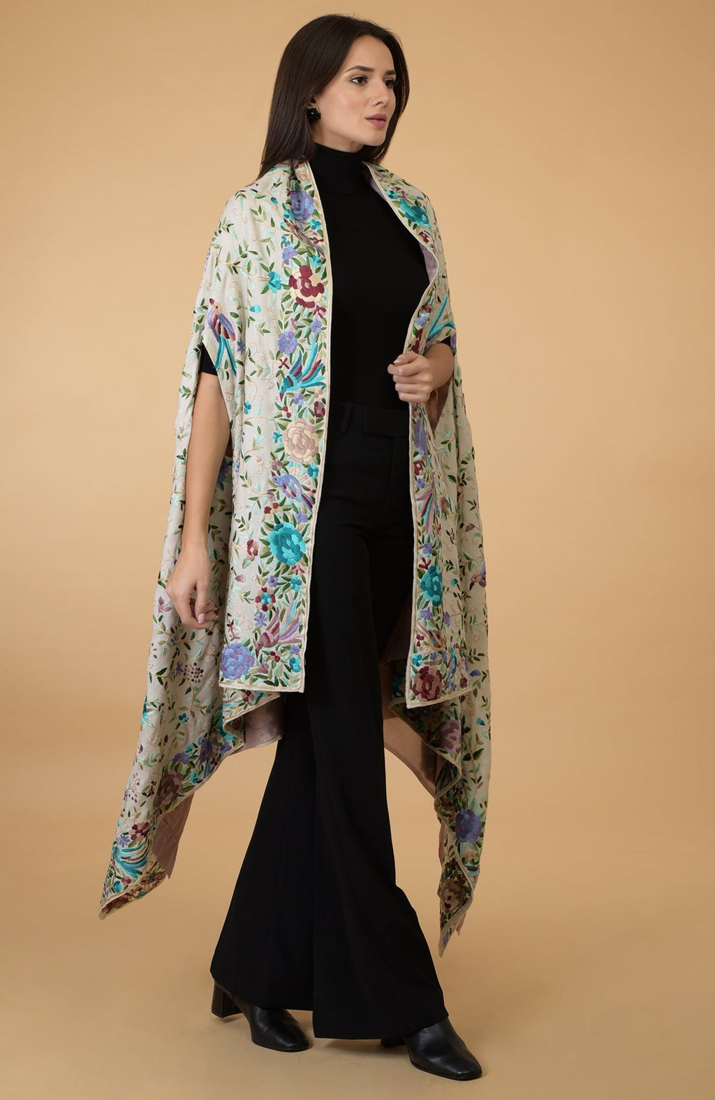 Ivory Parsi Gara pure pashmina shawl cape with intricate floral and bird embroidery.