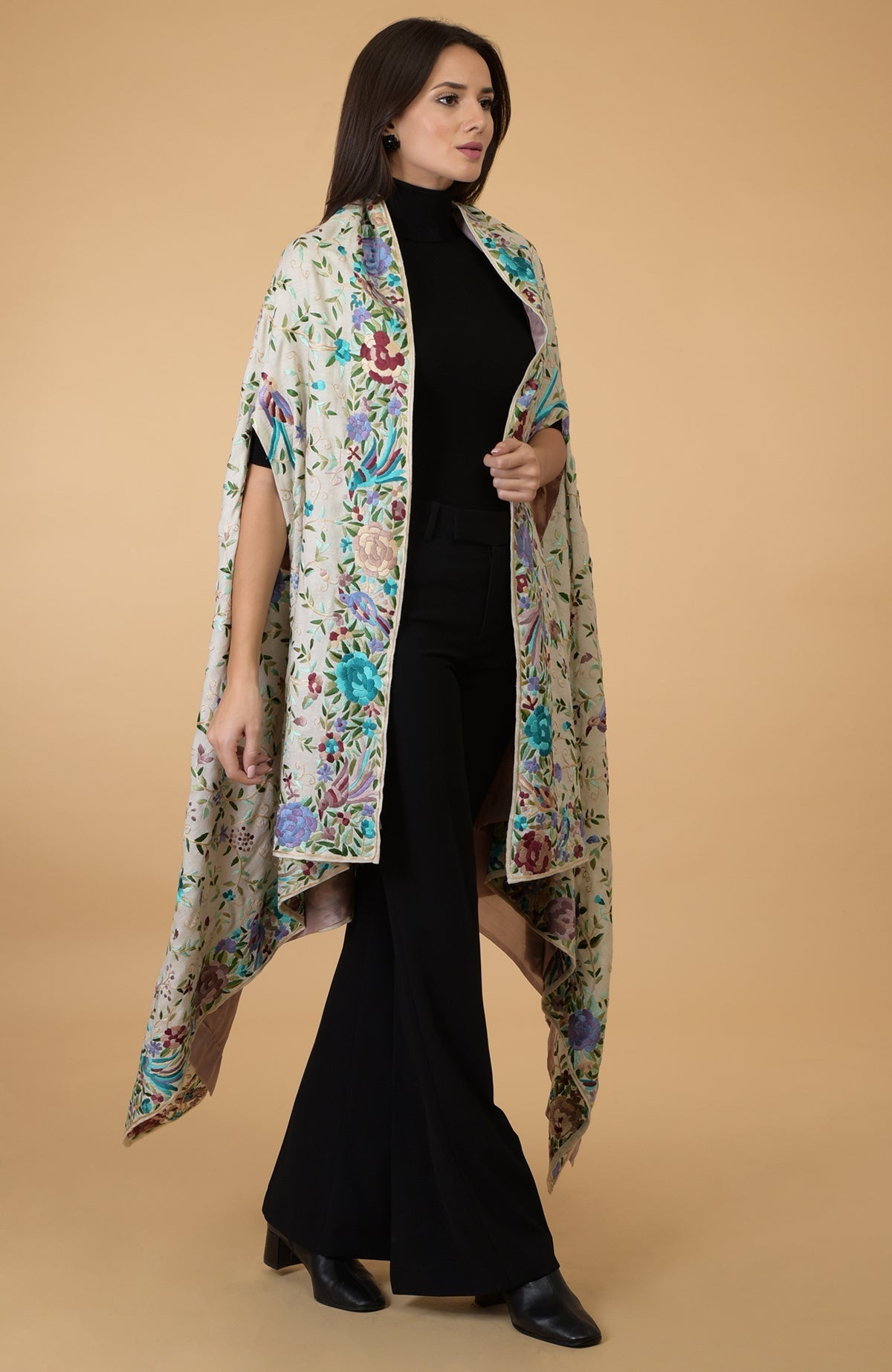 Ivory Parsi Gara pure pashmina shawl cape with intricate floral and bird embroidery.