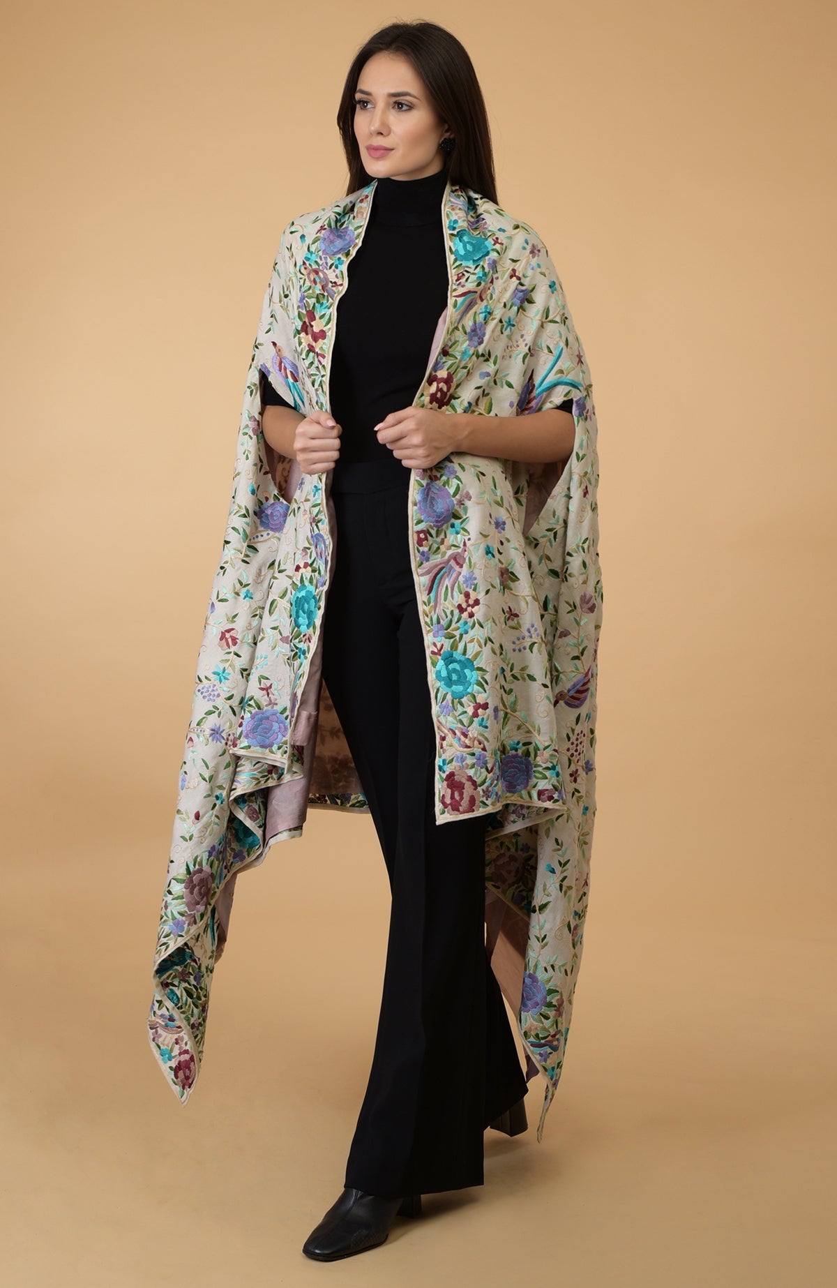 Ivory Parsi Gara Pure Pashmina Shawl Cape with intricate floral and bird embroidery.