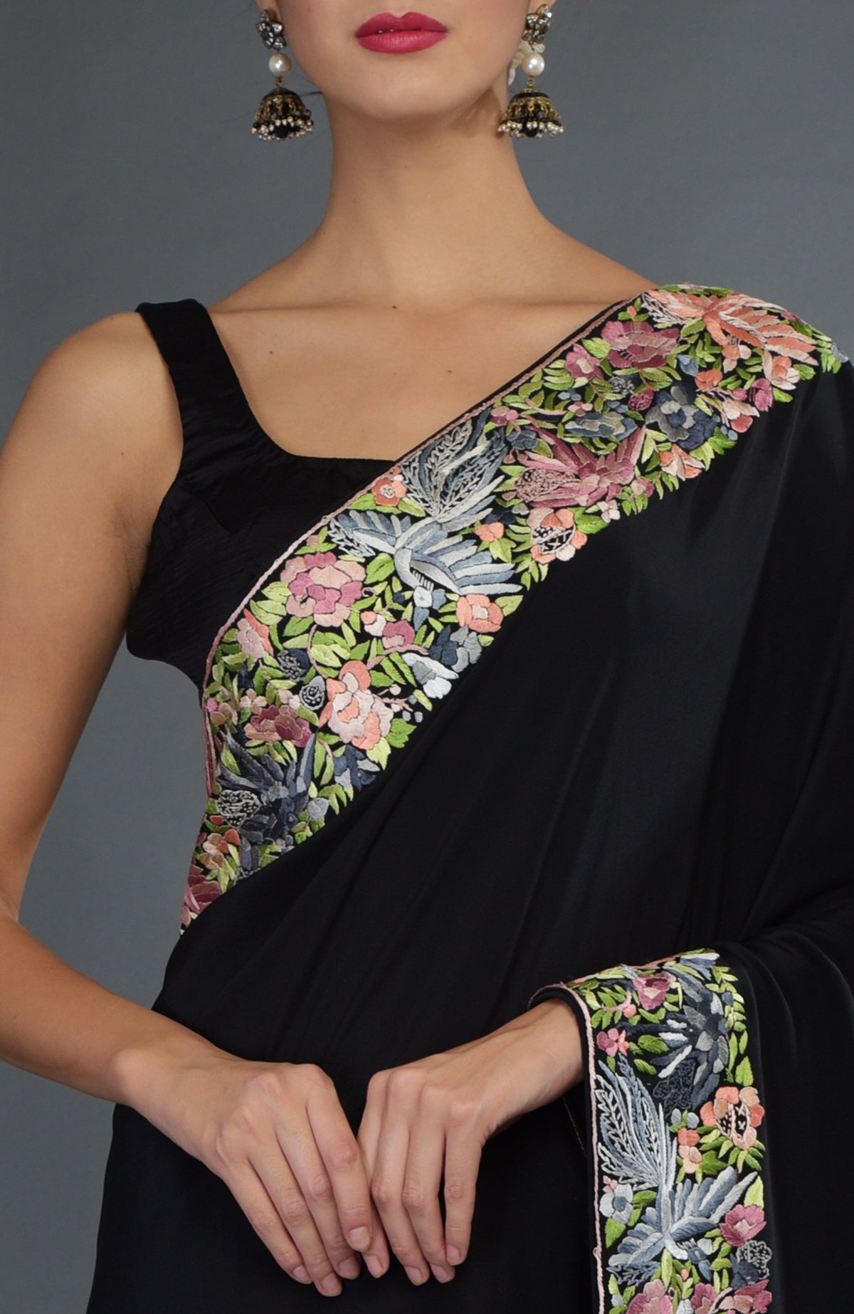 Black Parsi Gara hand embroidered saree with floral and bird motifs.