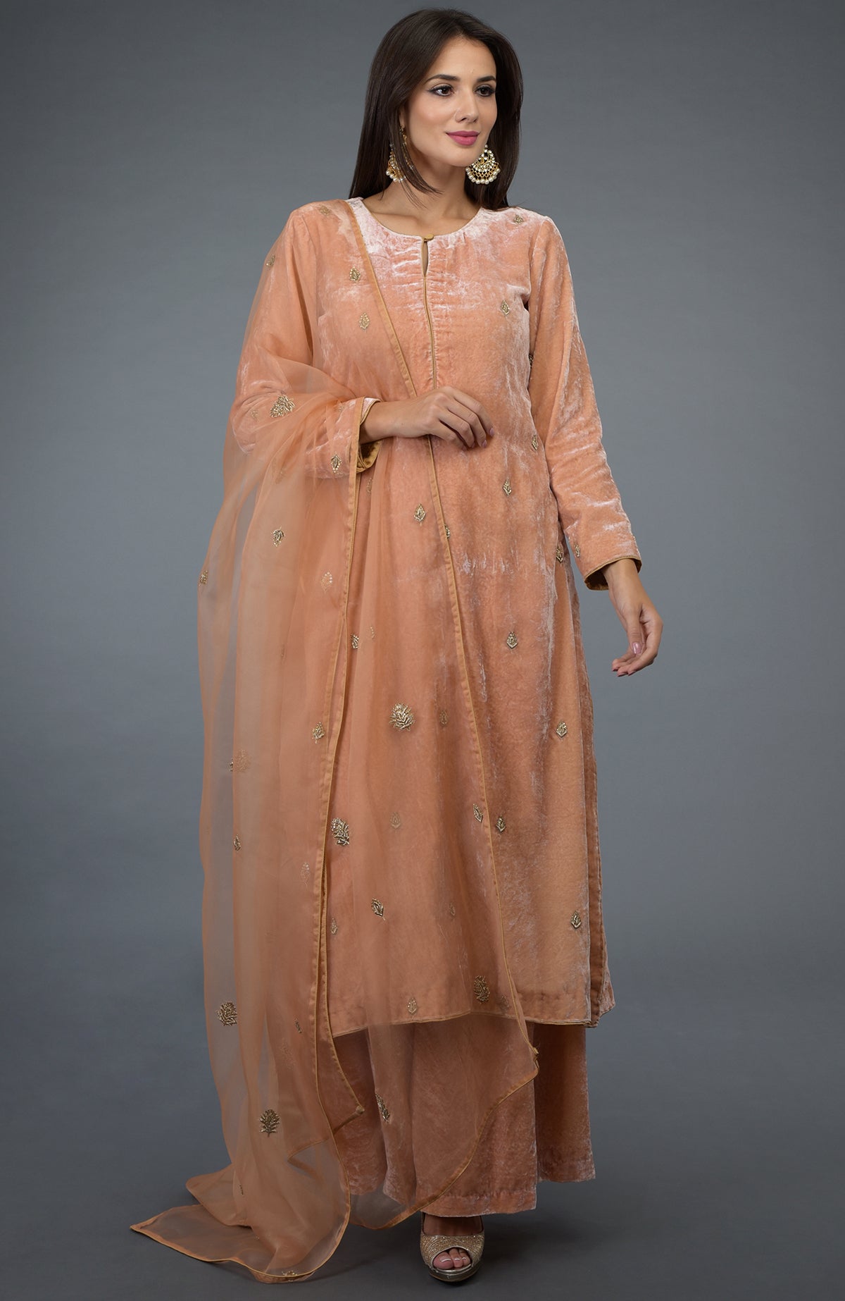 Peach Rose Zardozi Hand Embroidered Silk Velvet Suit with a matching dupatta.