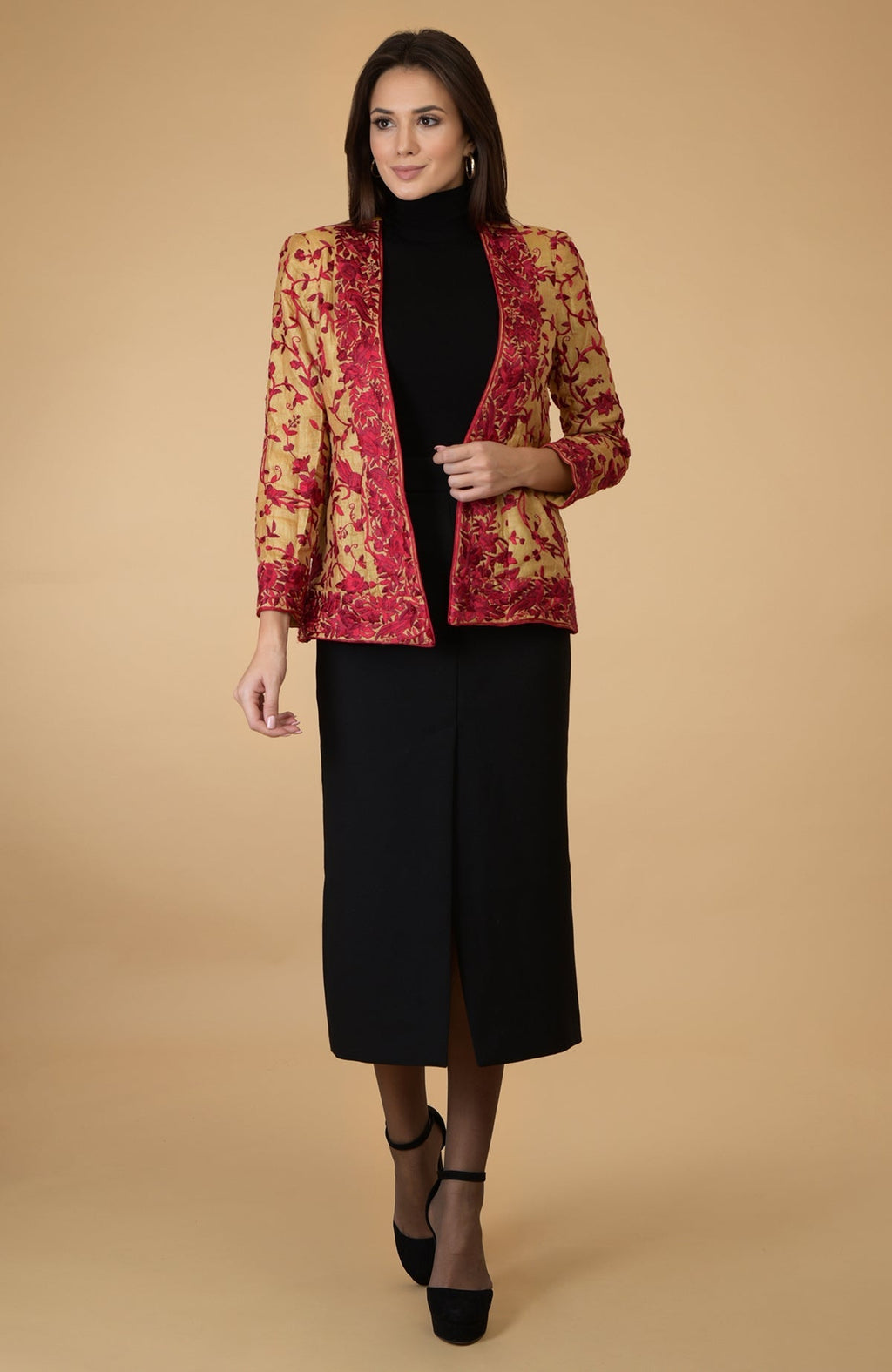 Fawn Parsi Gara embroidered shrug jacket with red floral and bird motifs.