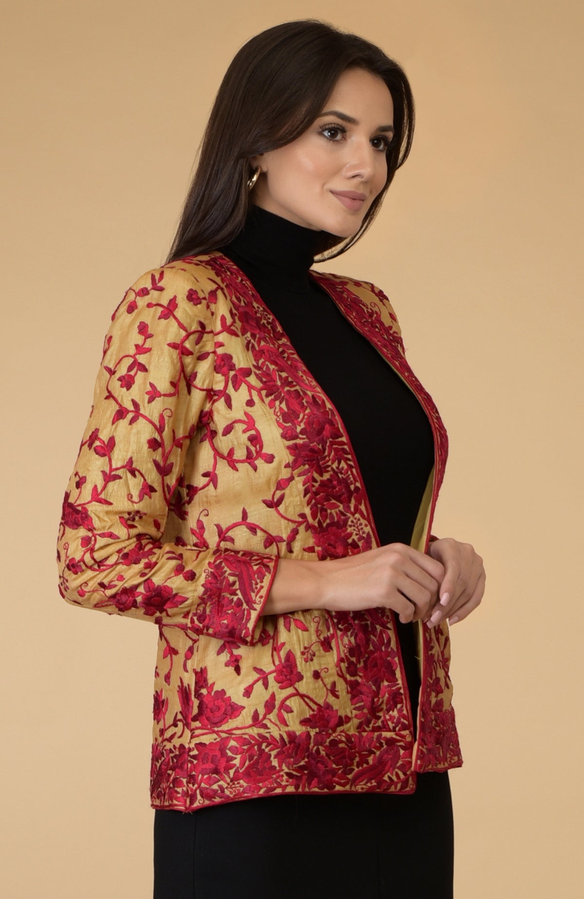 Fawn Parsi Gara embroidered shrug jacket with red floral and bird motifs.