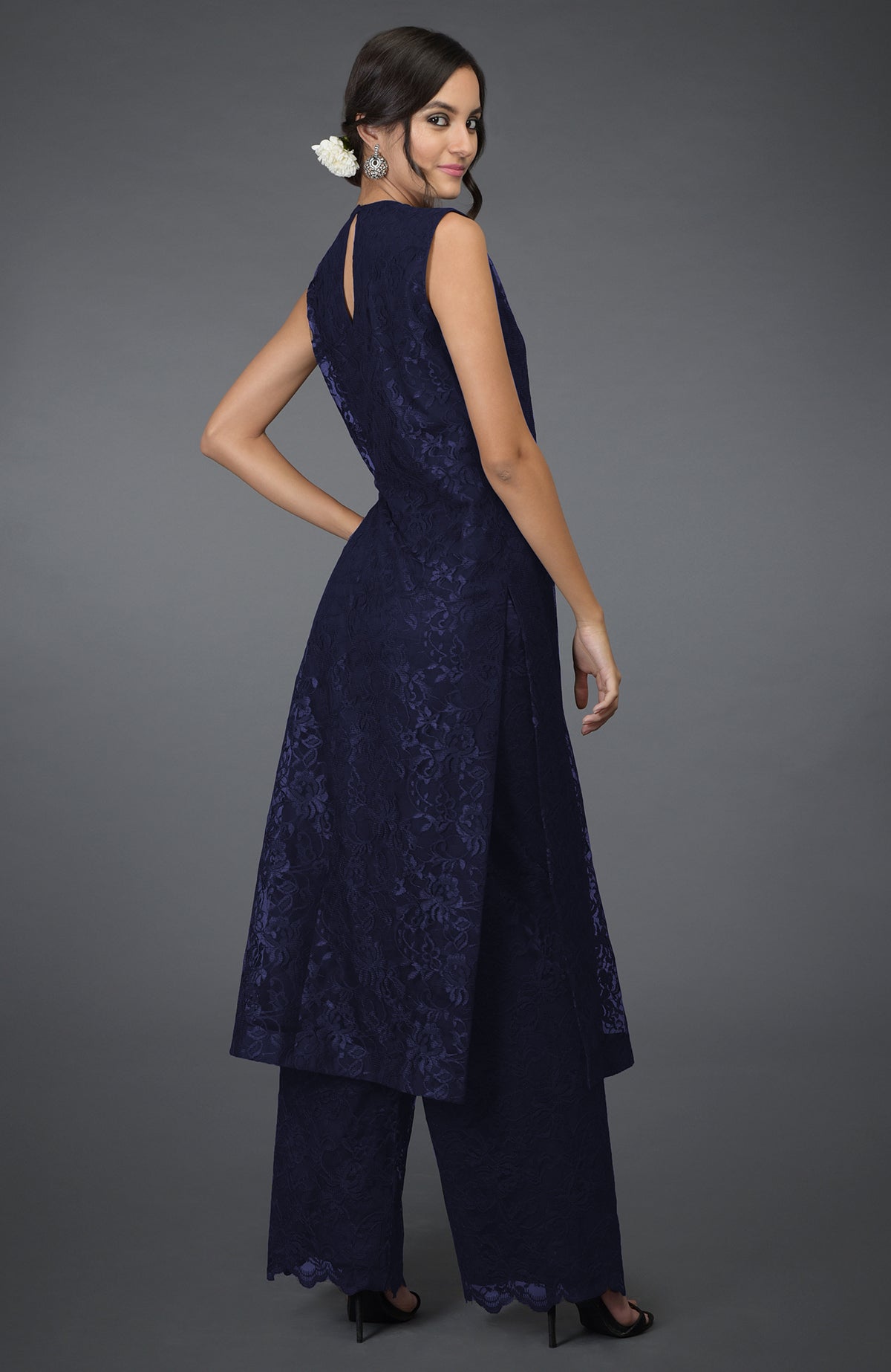 Sleeveless eclipse blue lace tunic kurta with jewel neckline and wide-leg pants.