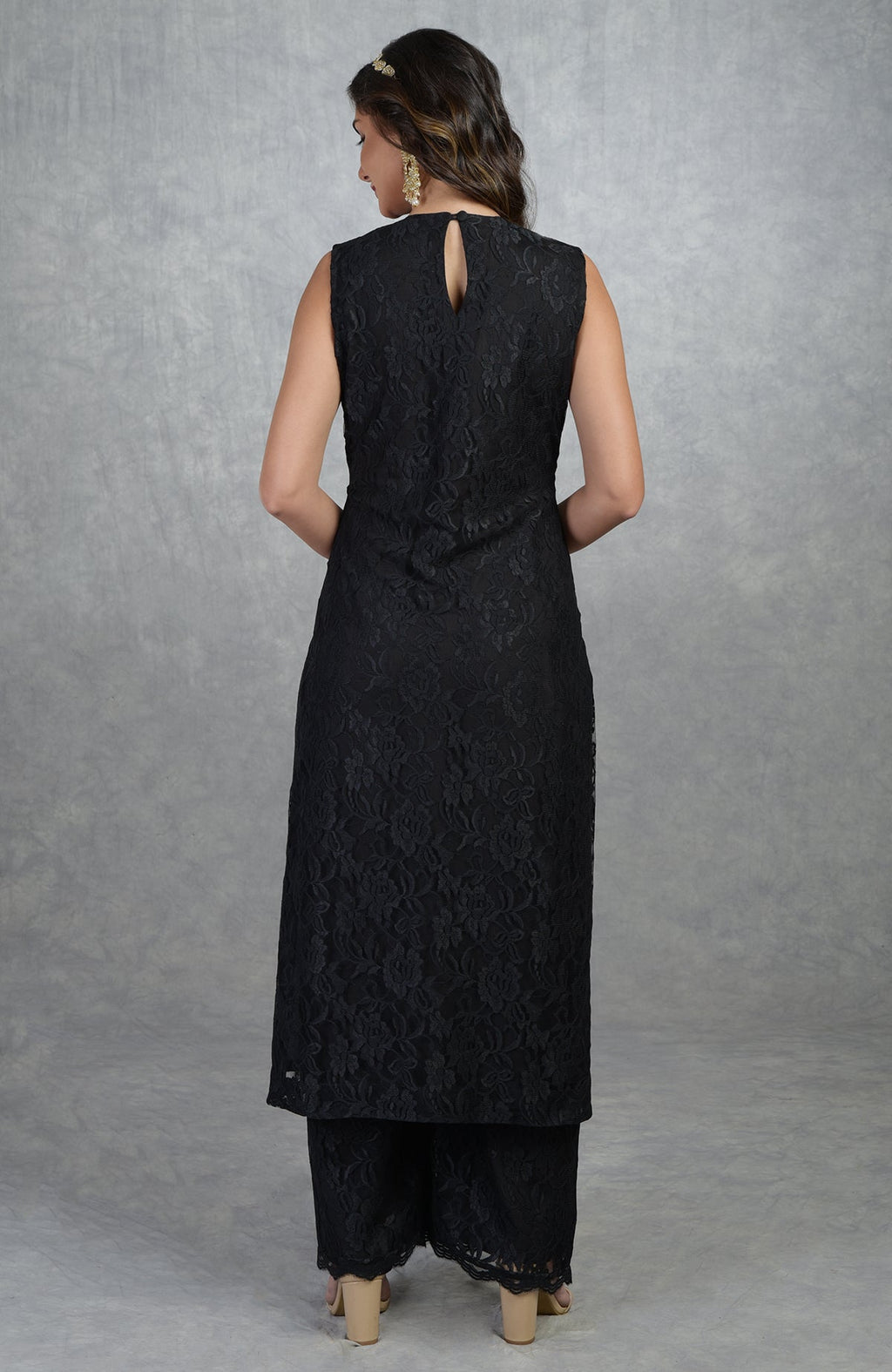 Black fine lace tunic kurta with wide-leg pants, viewed from the back.