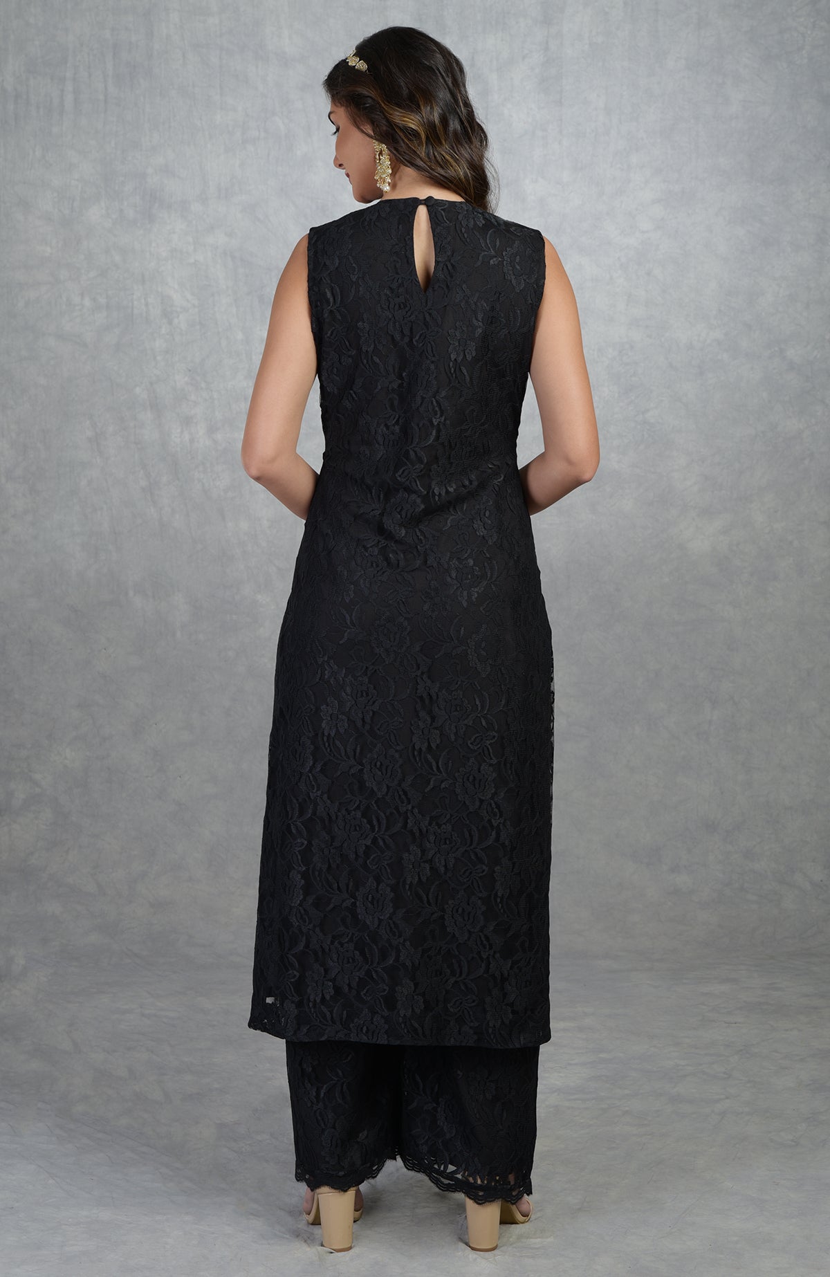 Black fine lace tunic kurta with wide-leg pants, viewed from the back.