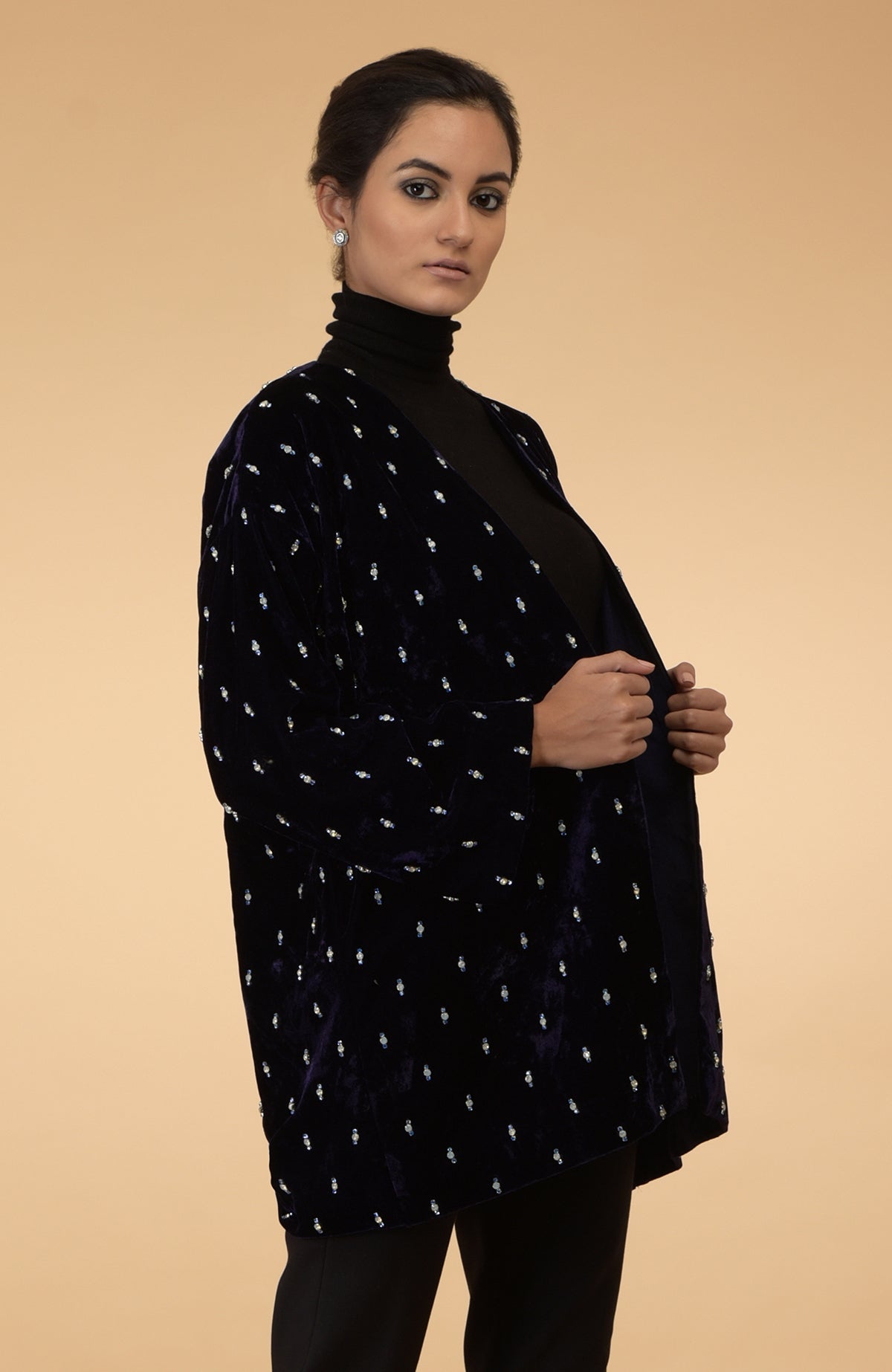 Eclipse blue silk velvet jacket with crystal hand embroidery.