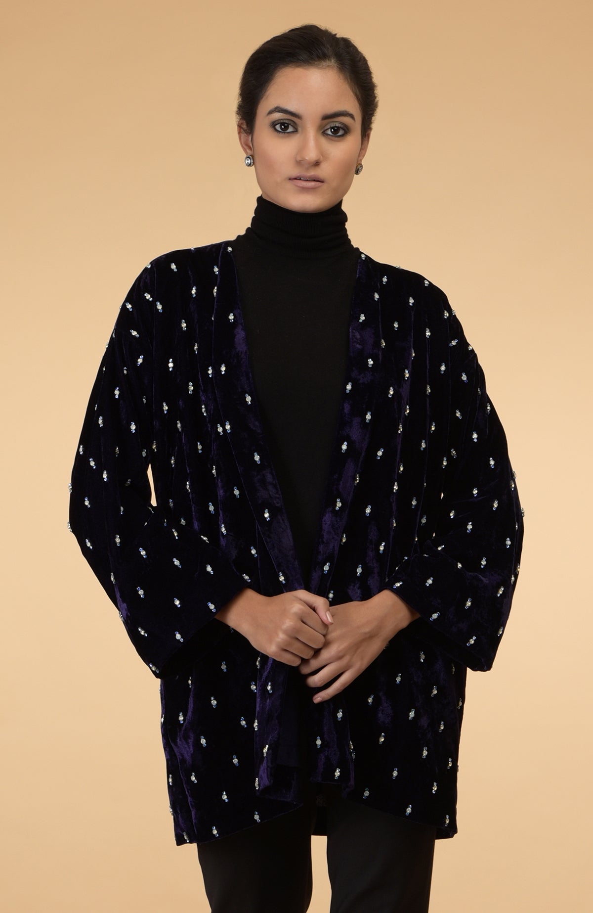 Eclipse blue silk velvet jacket with crystal hand embroidery.