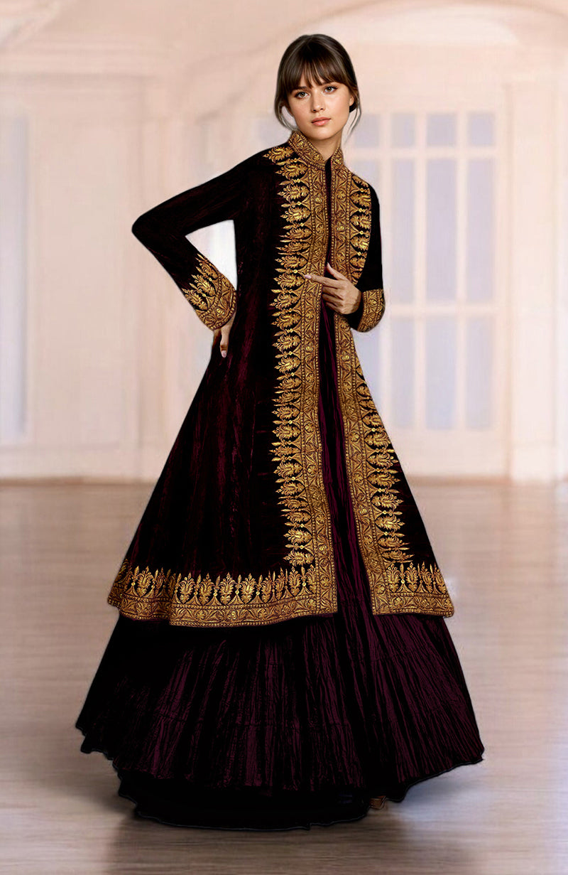 Maroon silk velvet jacket with gold Kashmiri Tilla embroidery and a crushed silk skirt.