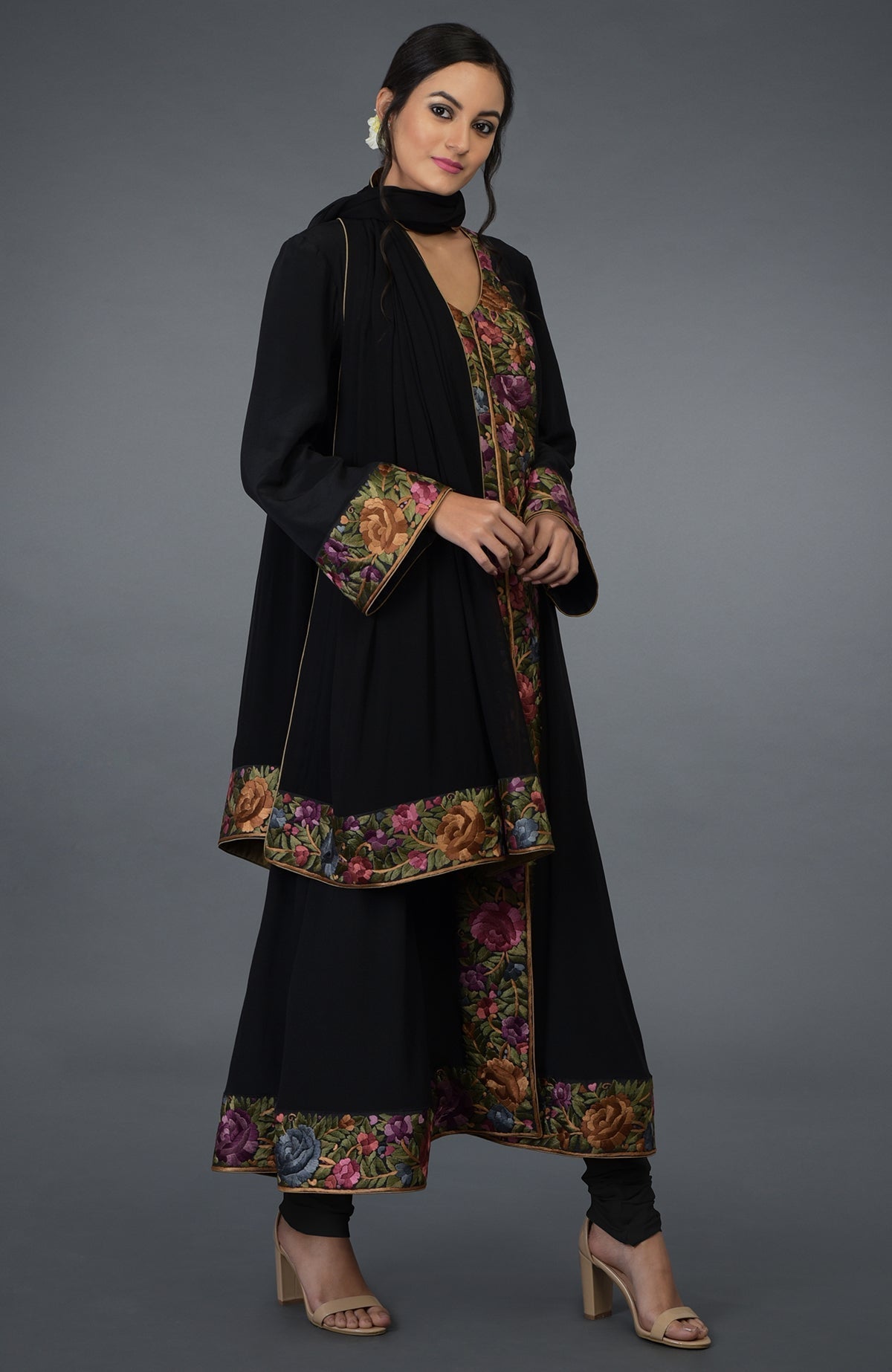 Black Anarkali suit with purple and green Parsi Gara embroidery and matching dupatta.