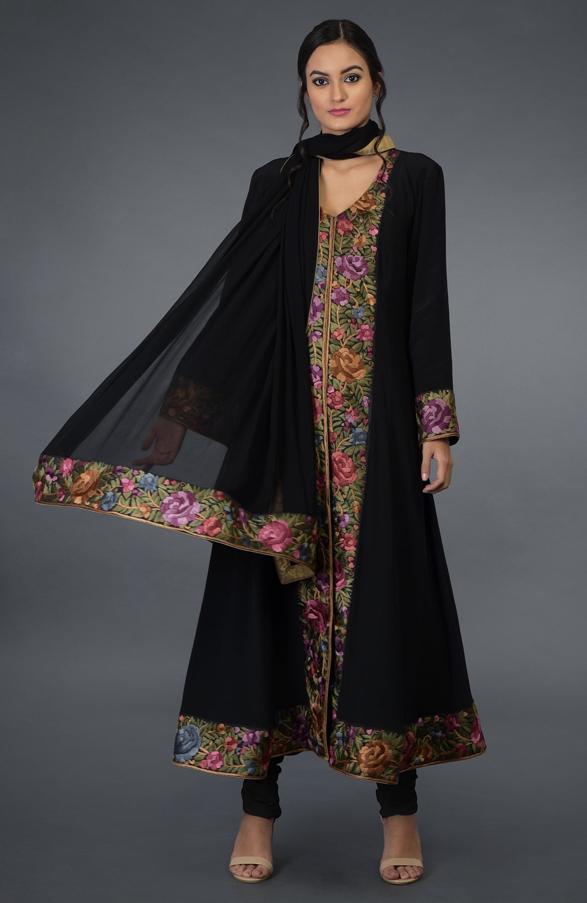Black Anarkali suit with purple and green Parsi Gara embroidery and bell sleeves.