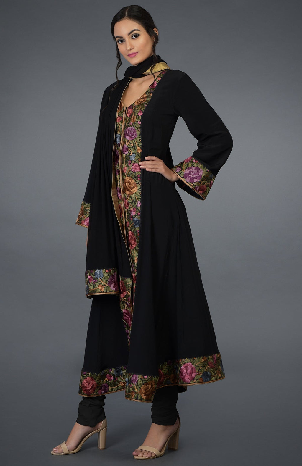 Black Anarkali suit with multicolor Parsi Gara embroidery and bell sleeves with matching dupatta.