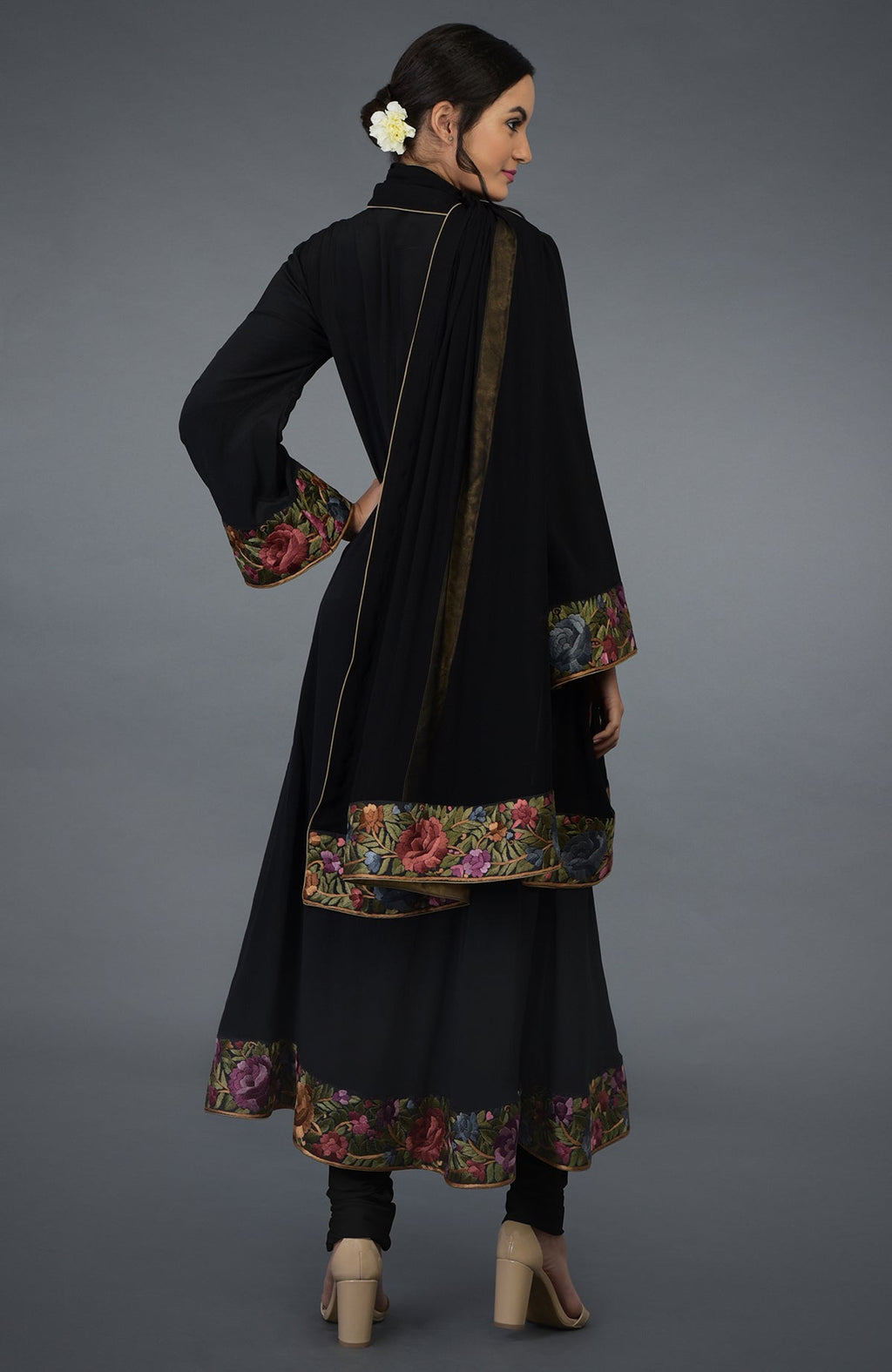 Black Anarkali suit with purple and green Parsi Gara embroidery and bell sleeves.