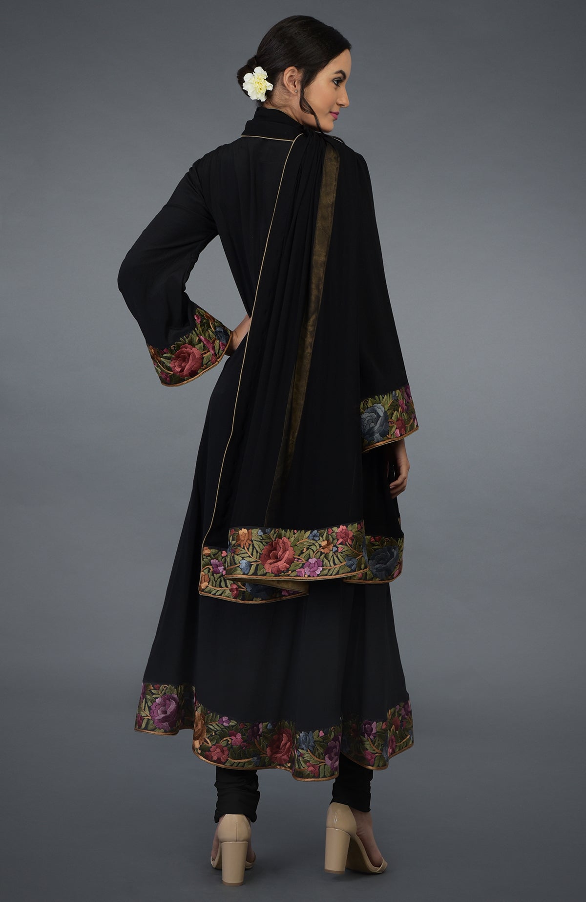 Black Anarkali suit with purple and green Parsi Gara embroidery and bell sleeves.