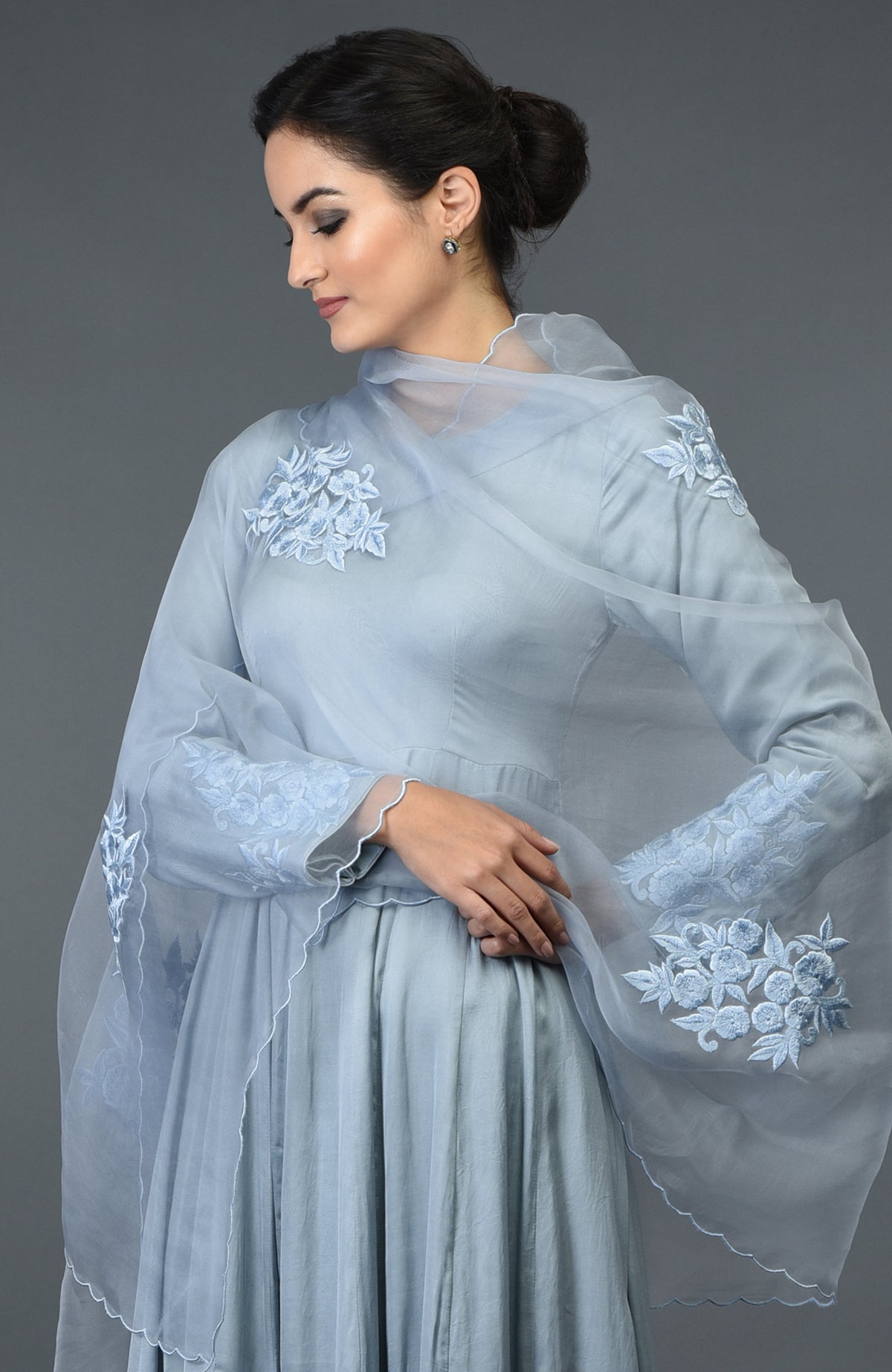 Powder blue floral embroidered Anarkali suit with a matching dupatta.