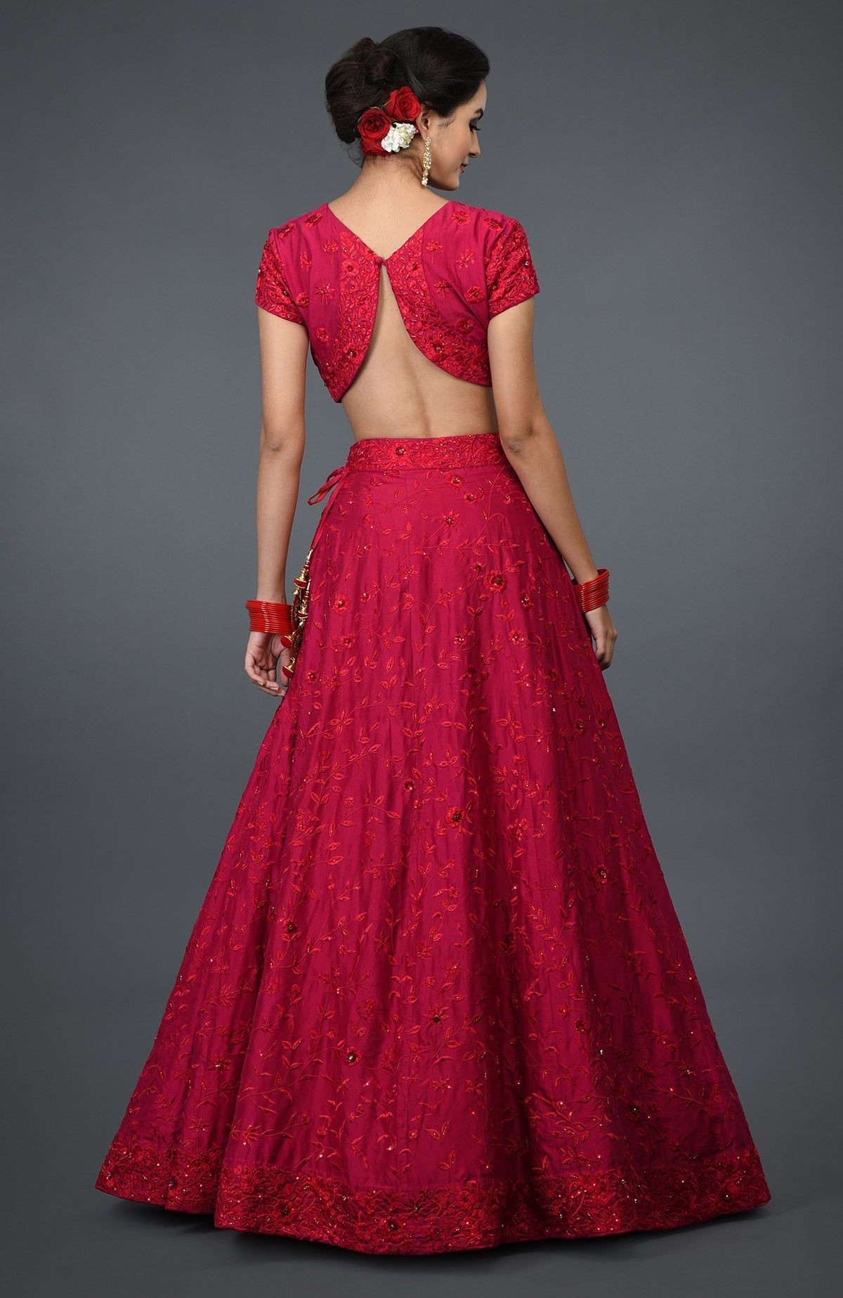 Red floral resham, sequin, and beads embroidered lehenga outfit.