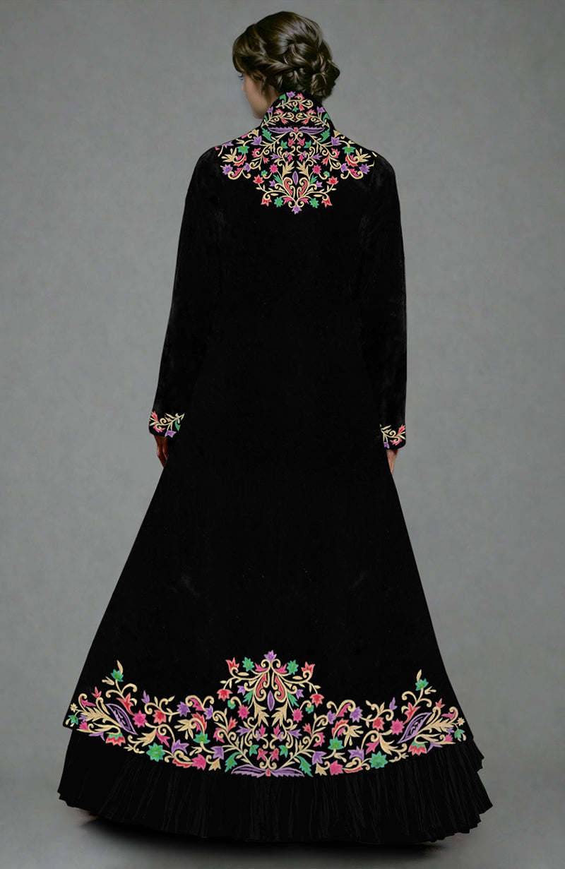 Black velvet jacket with multicolor floral Parsi Gara embroidery paired with a crushed silk tiered skirt