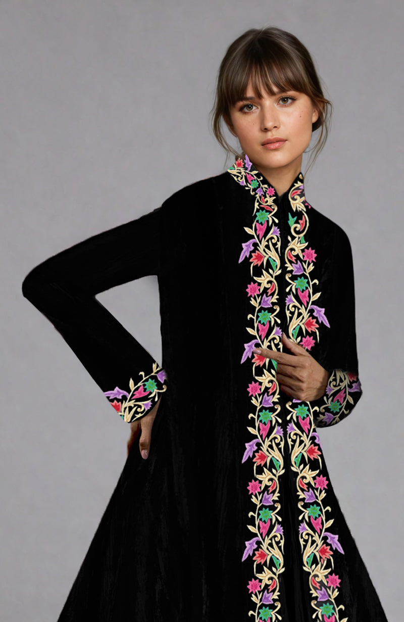 Black velvet jacket with colorful Parsi Gara floral embroidery paired with a crushed silk tiered skirt