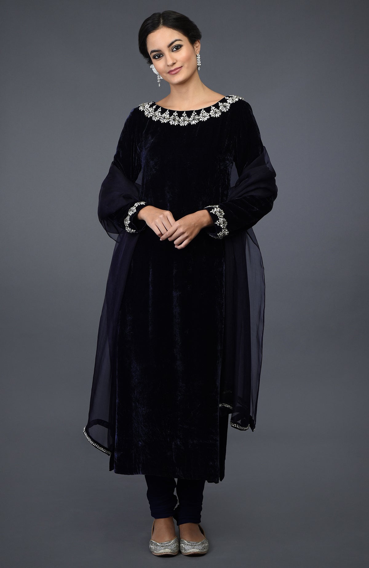 Midnight blue velvet suit with Swarovski hand embroidery on the neckline and sleeves.