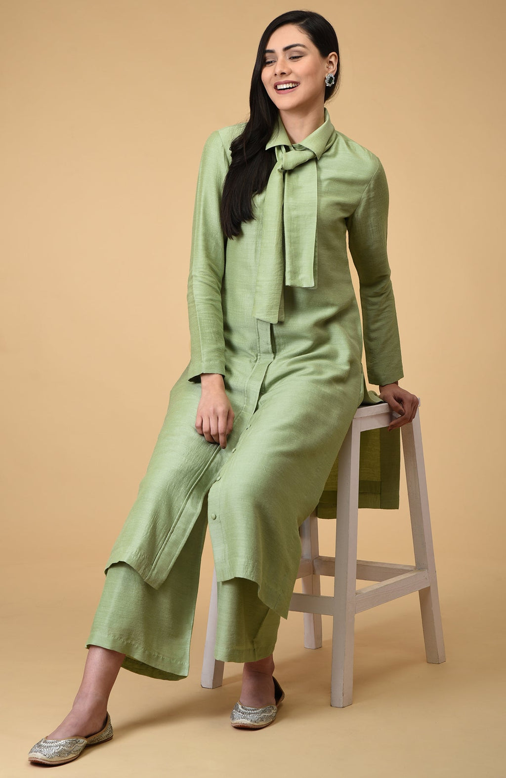 Sage tie neck kurta set with wide-leg pants.