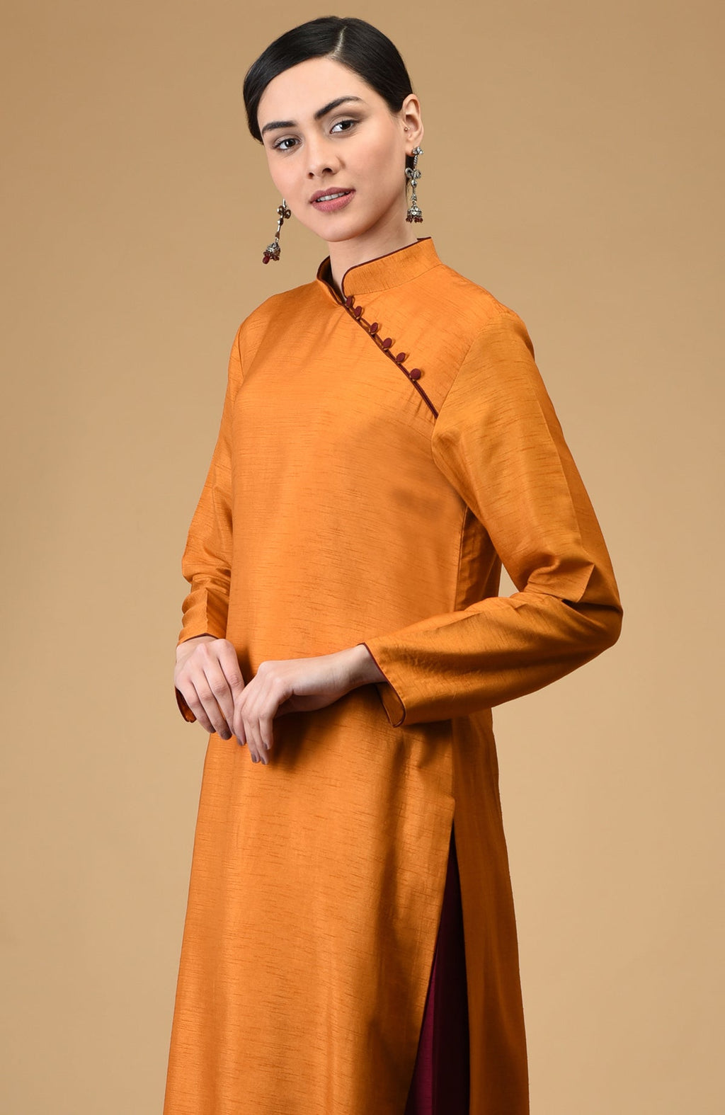 Mustard-maroon mandarin collared kurta set with a cross-front opening and loop buttons.