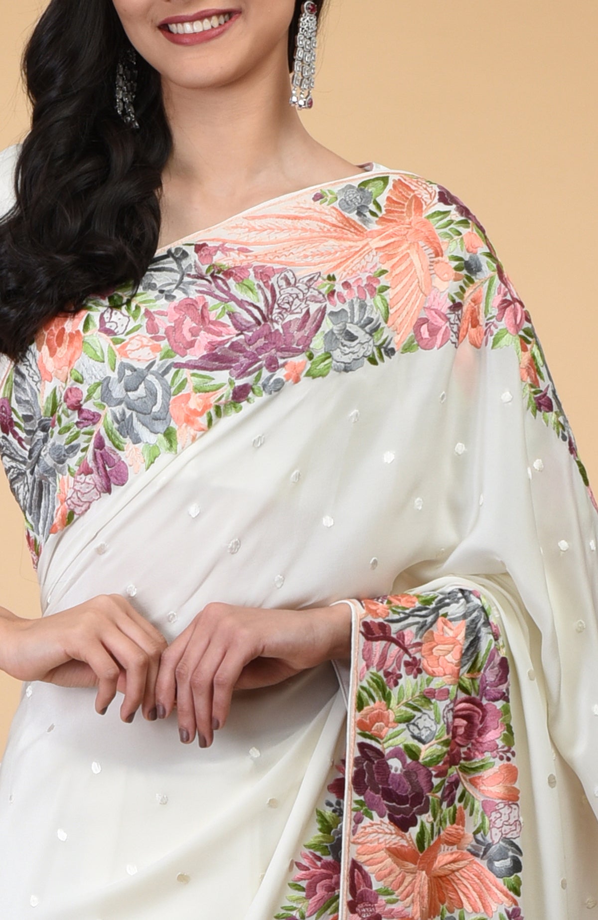 Ivory Parsi Gara hand embroidered saree with floral and bird motifs.