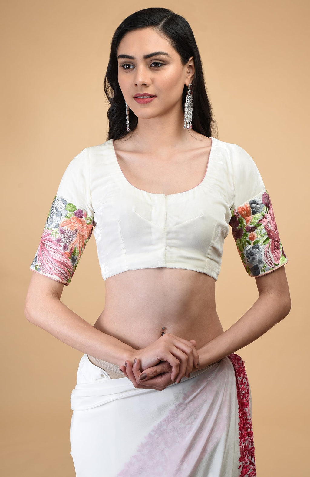 Ivory Parsi Gara hand embroidered saree with a matching blouse.