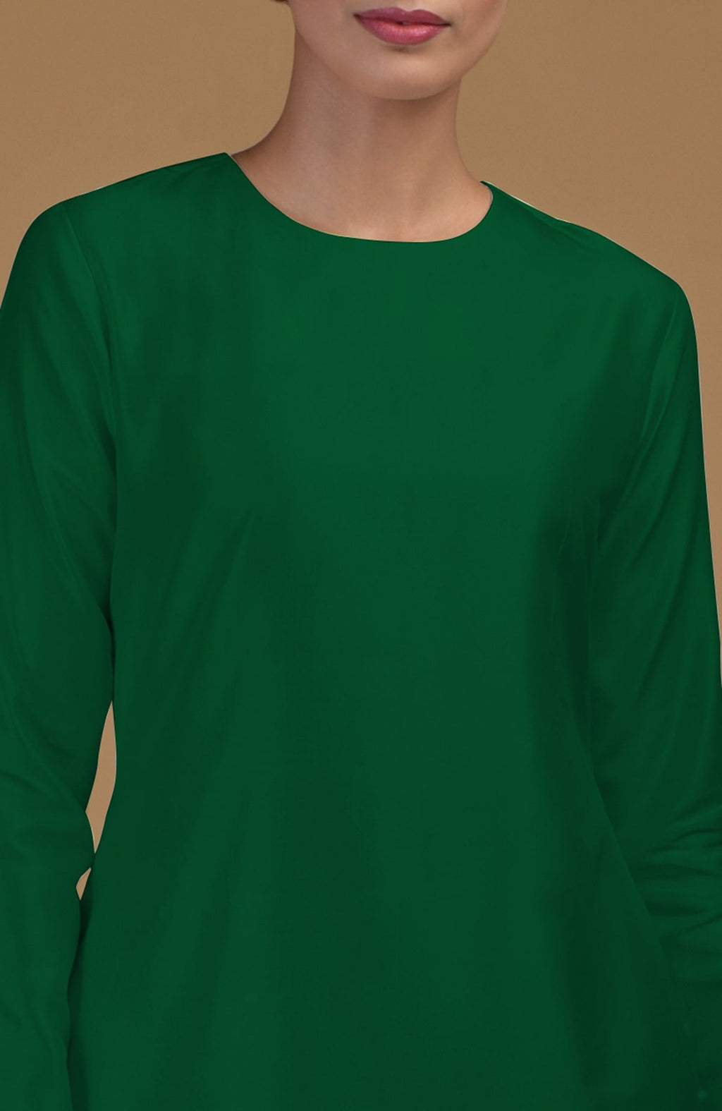 An emerald green pure Matka silk kurta with a jewel neck and long sleeves.