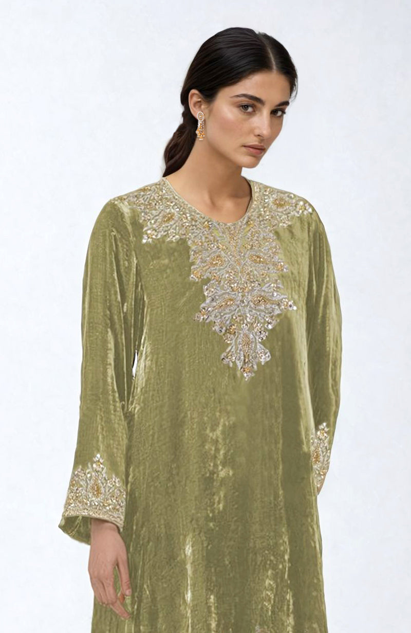 Bog green velvet pheran kurta with intricate gold and silver embroidery.