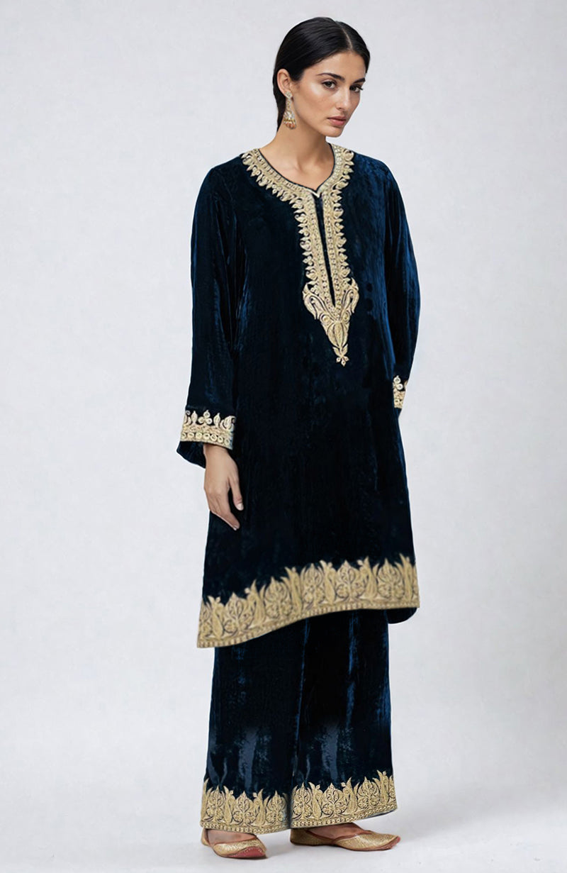 Midnight blue velvet kurta set with gold Kashmiri tilla dozi embroidery.