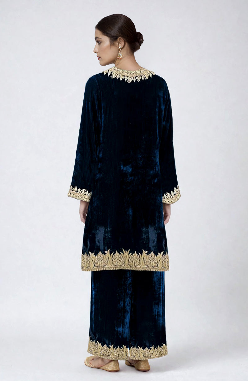 Midnight blue velvet kurta set with gold Kashmiri tilla dozi embroidery.