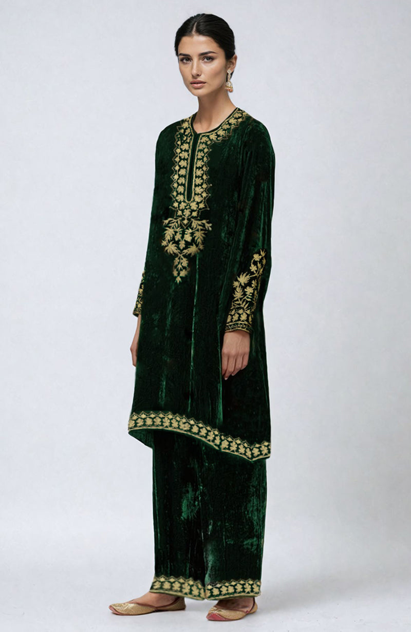Emerald green velvet kurta set with gold Kashmiri tilla aari embroidery.