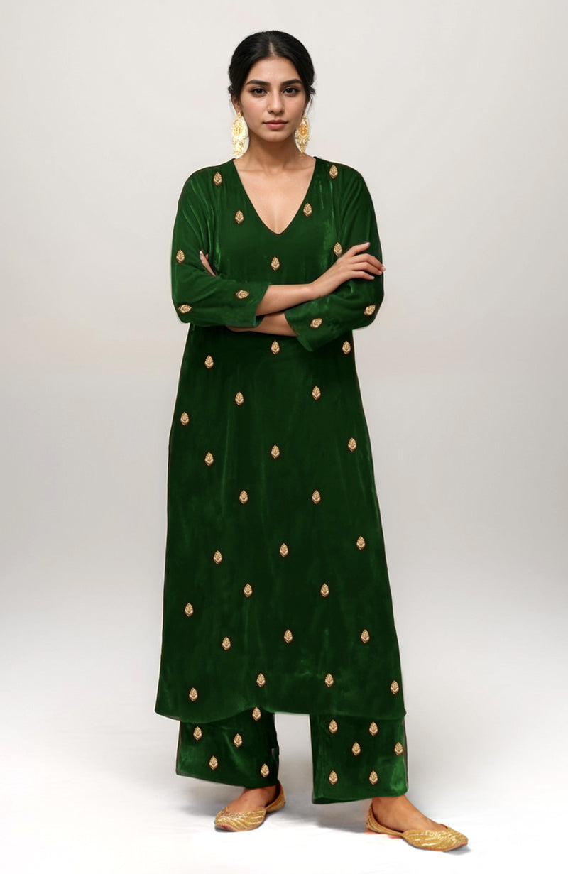 Emerald green velvet kurta set with gold dabka zardozi embroidery.