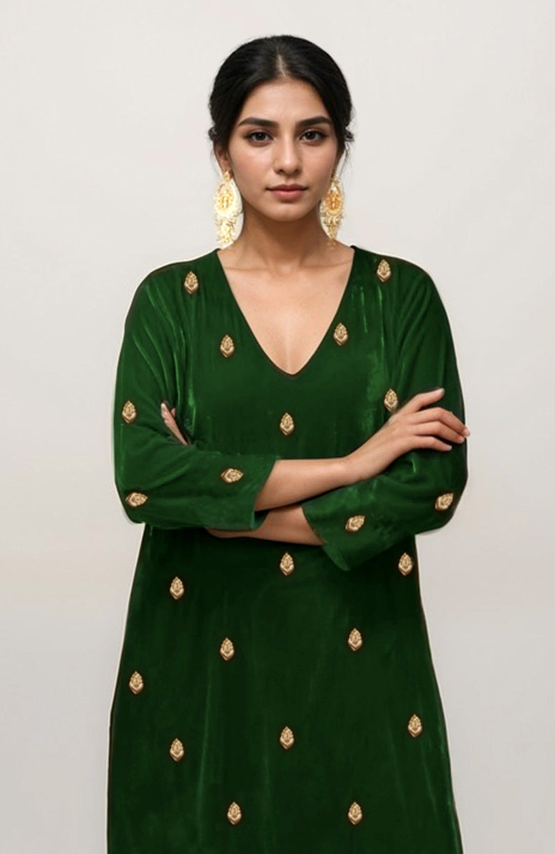 Emerald green velvet kurta with gold dabka zardozi hand embroidery.