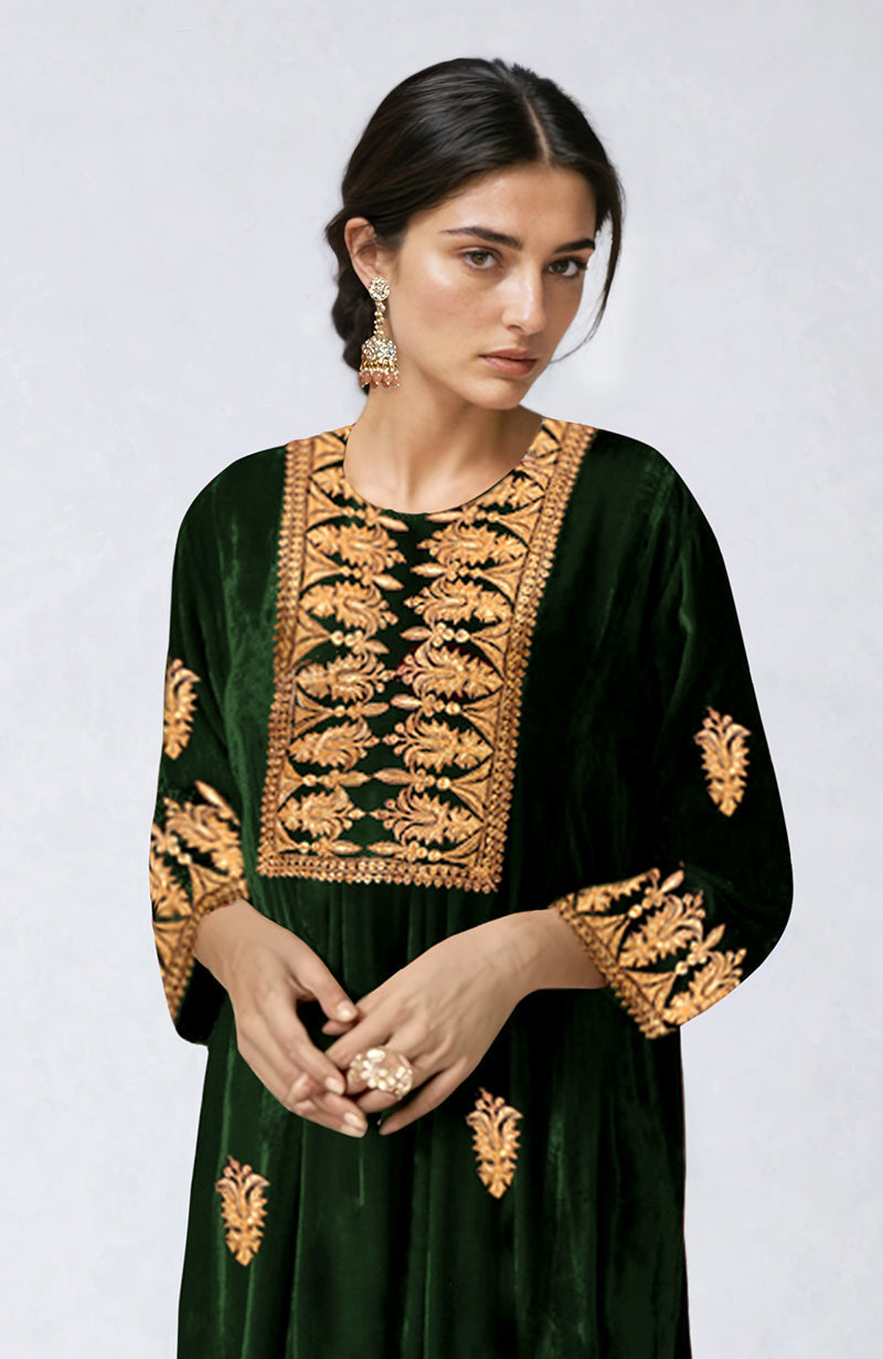 Emerald green velvet kurta with gold Kashmiri tilla dozi embroidery.