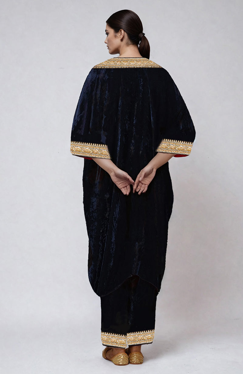 Midnight blue velvet kurta set with gold beads and zardozi embroidery.