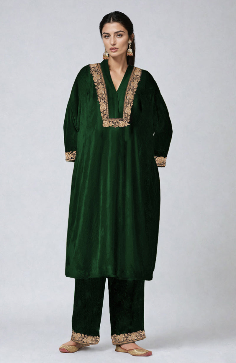 Emerald green velvet kurta set with Kashmiri tilla dozi embroidery.