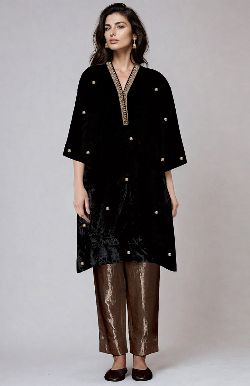 Midnight blue velvet kurta with silver Kashmiri Tilla embroidery and matching tissue pants.