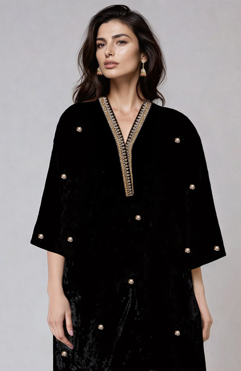 Black velvet kurta with gold zardozi embroidery and scattered bootahs.