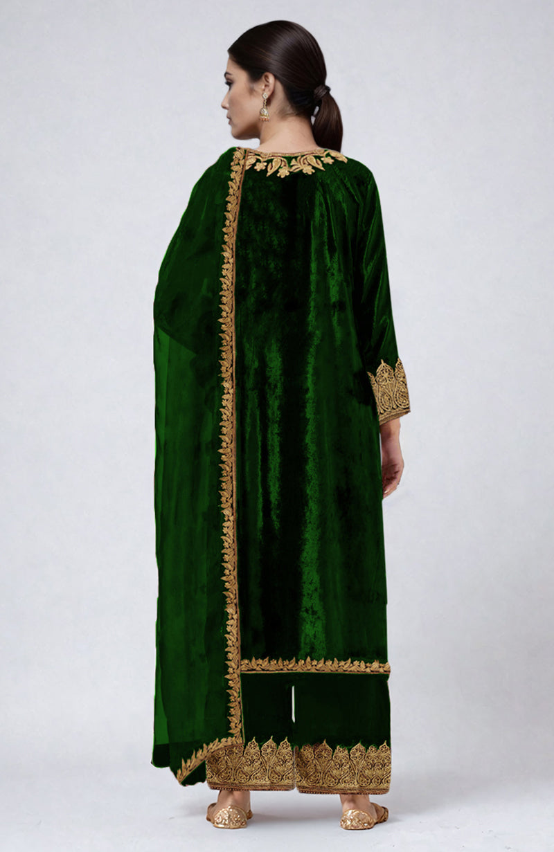 Emerald green velvet palazzo set with gold Kashmiri Tilla Aari embroidery.