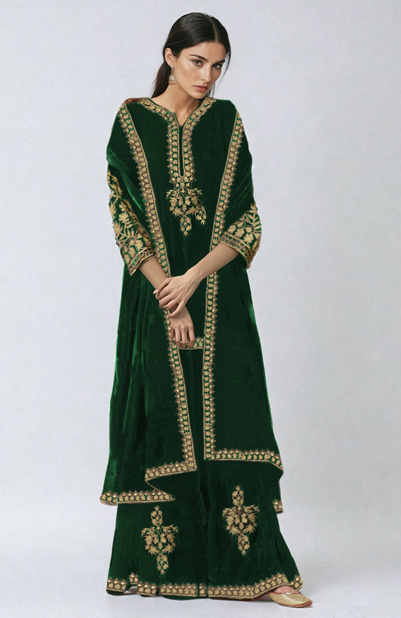 Emerald green velvet sharara set with antique gold tilla embroidery.