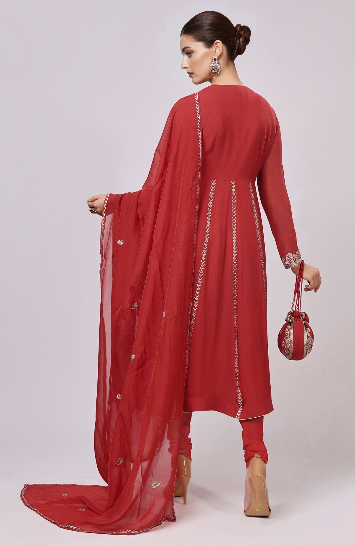 Red Anarkali set with Kashmiri Tilla Aari embroidery, sheer dupatta, and slim churidar.