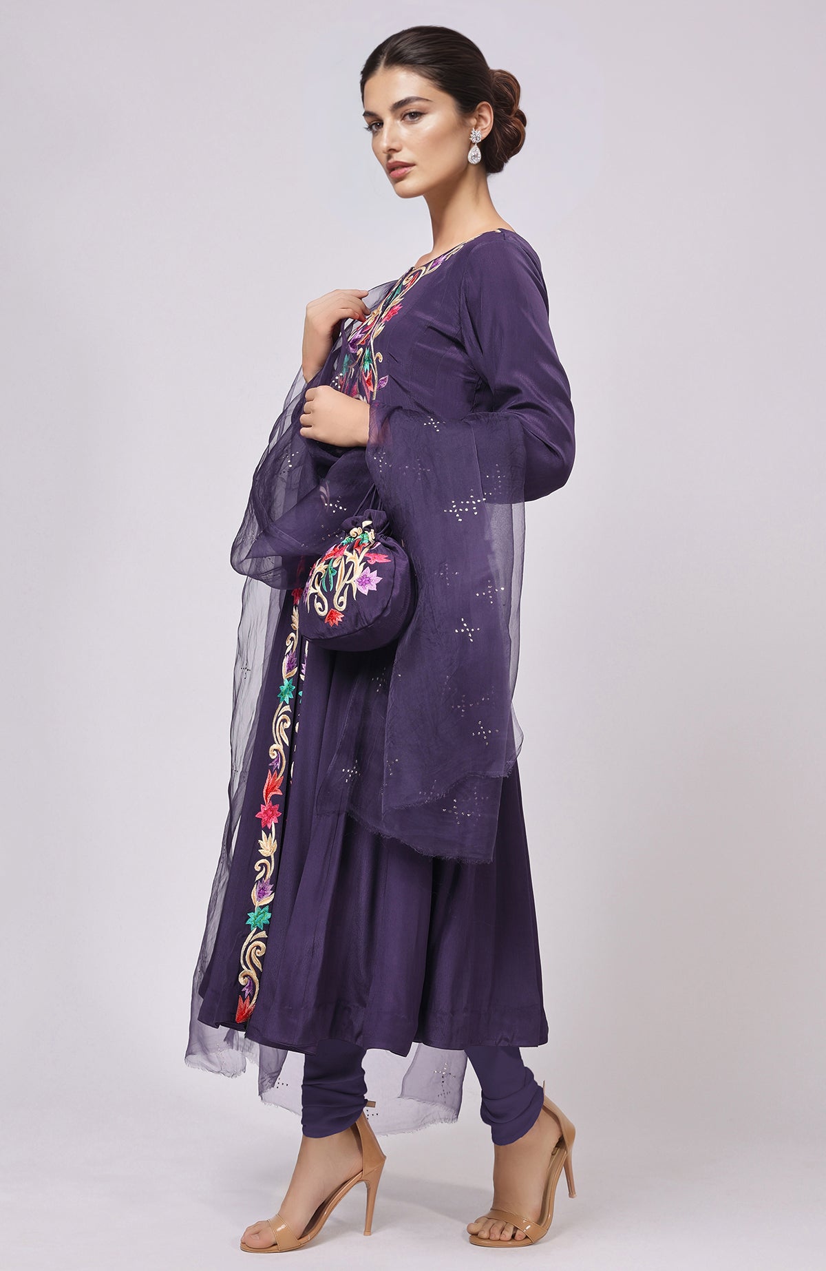 Eclipse Blue Anarkali set with intricate Resham Gara embroidery and matching dupatta and potli bag.