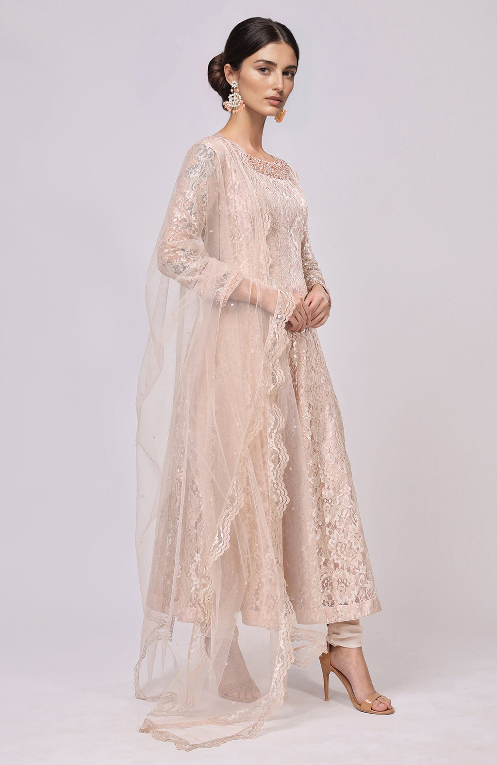 Champagne lace anarkali set with a net dupatta and churidar.