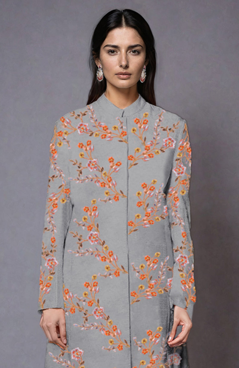 Grey jacket with colorful floral embroidery and a band collar.