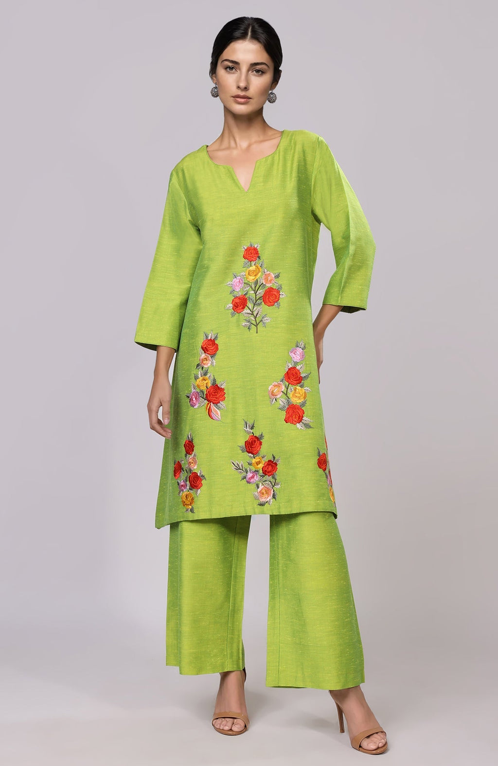Citrus green co-ord with Parsi Gara floral embroidery and asymmetrical top with wide-leg pants.